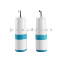 ceramic oil and vinegar bottle with silicone band and base